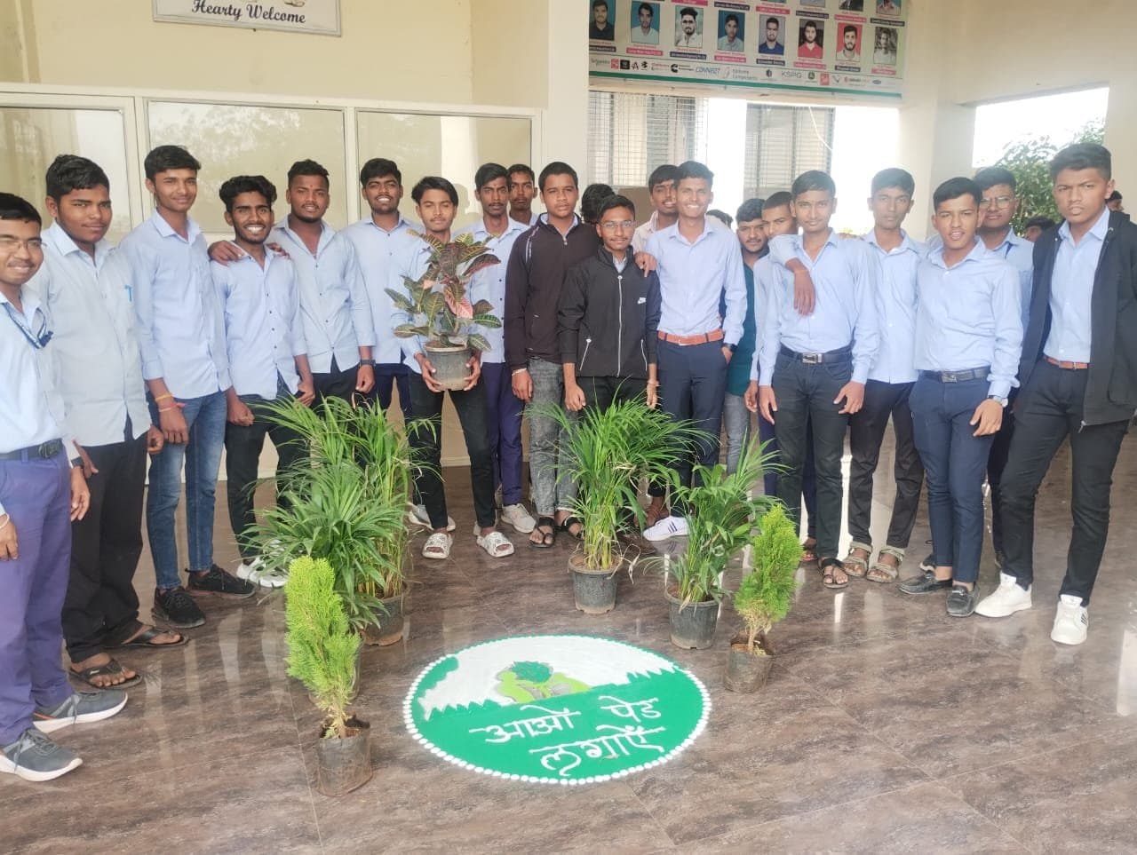 Students with saplings for the plant-a-tree campaign