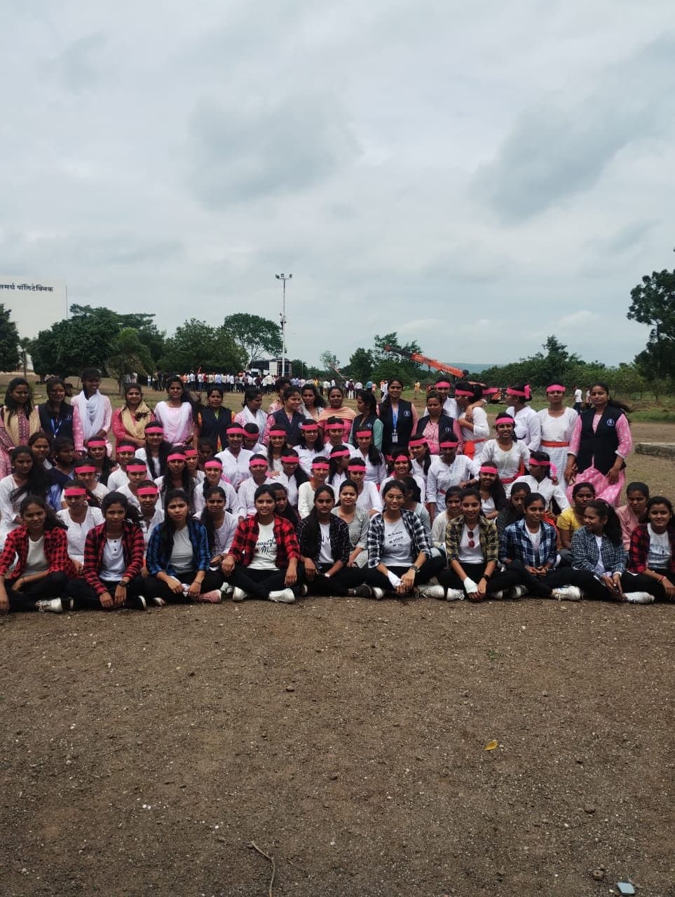 Students gathered on the campus ground