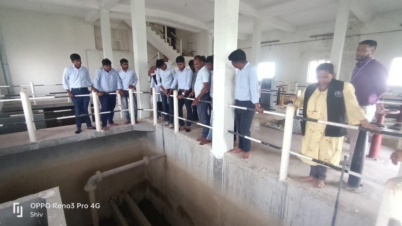 Students observing the inside of the water treatment plant